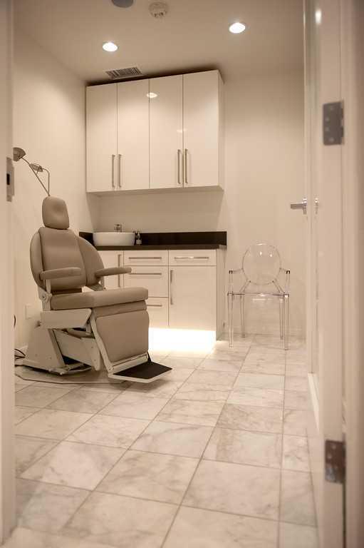 Dr. Nguyen's Beverly Hills medical office exam room, clean and shining with a comfortable procedure chair.